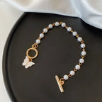 Opulent Pearl Butterfly Charm Bracelet - GlamoROZ