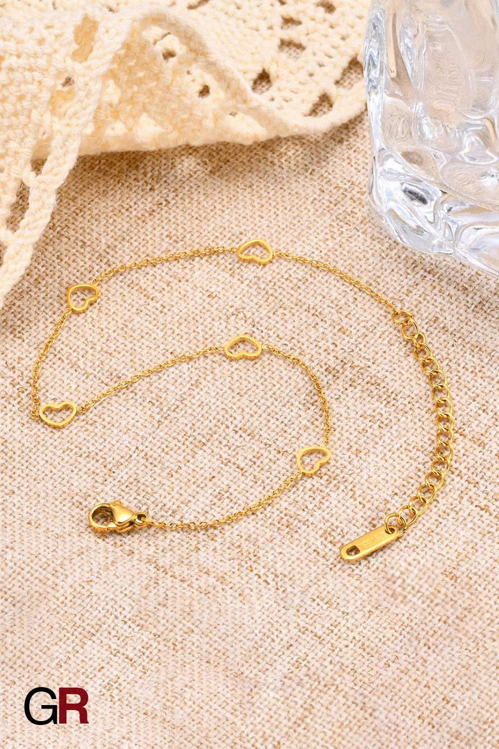 “GlamoROZ Coeur Divin Luminous Gold Charm Anklet Jewelry gold chain and clasp detail close-up”