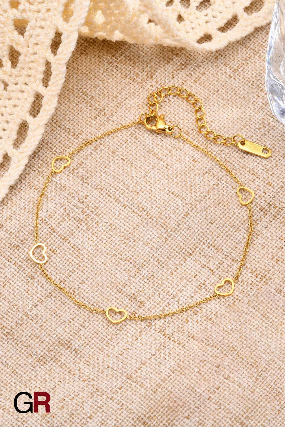 “GlamoROZ Coeur Divin Luminous Gold Charm Anklet Jewelry close-up of five heart charms”