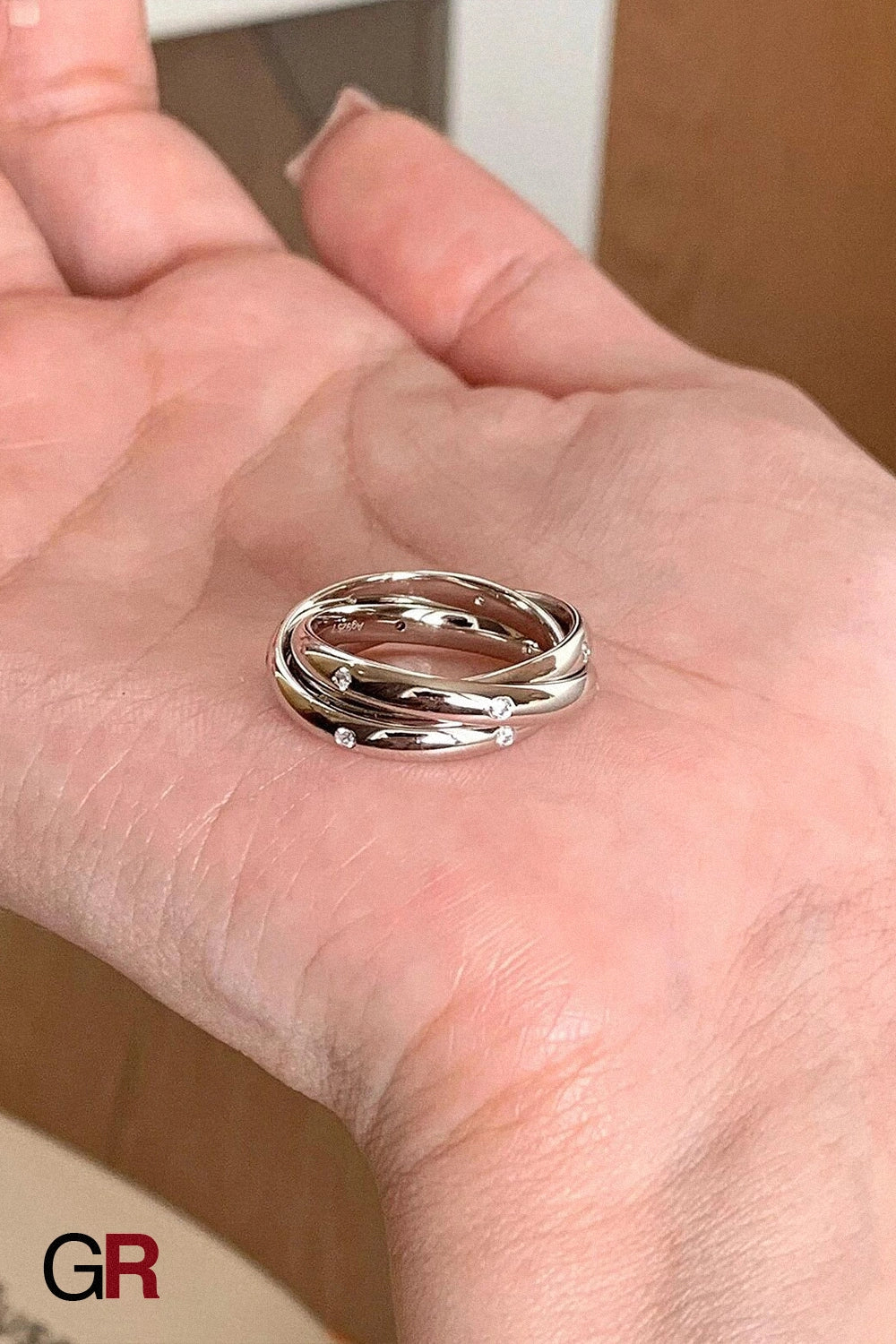 “GlamoROZ Éclat Entrelacé Silver Multi-Layer Trinity Ring Jewelry polished sterling silver detail close-up”