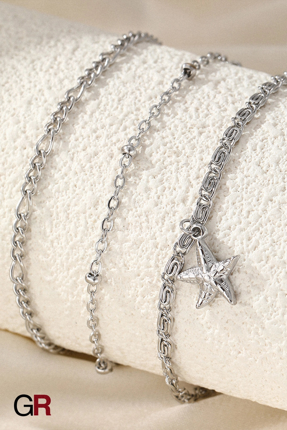 “GlamoROZ Golden Mare Layered Star Anklet adjustable clasp and chain texture detail”