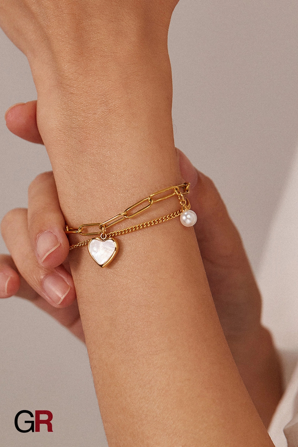 “GlamoROZ Lune Amour Luminous Gold Beaded Bracelet Jewelry front view on neutral background”