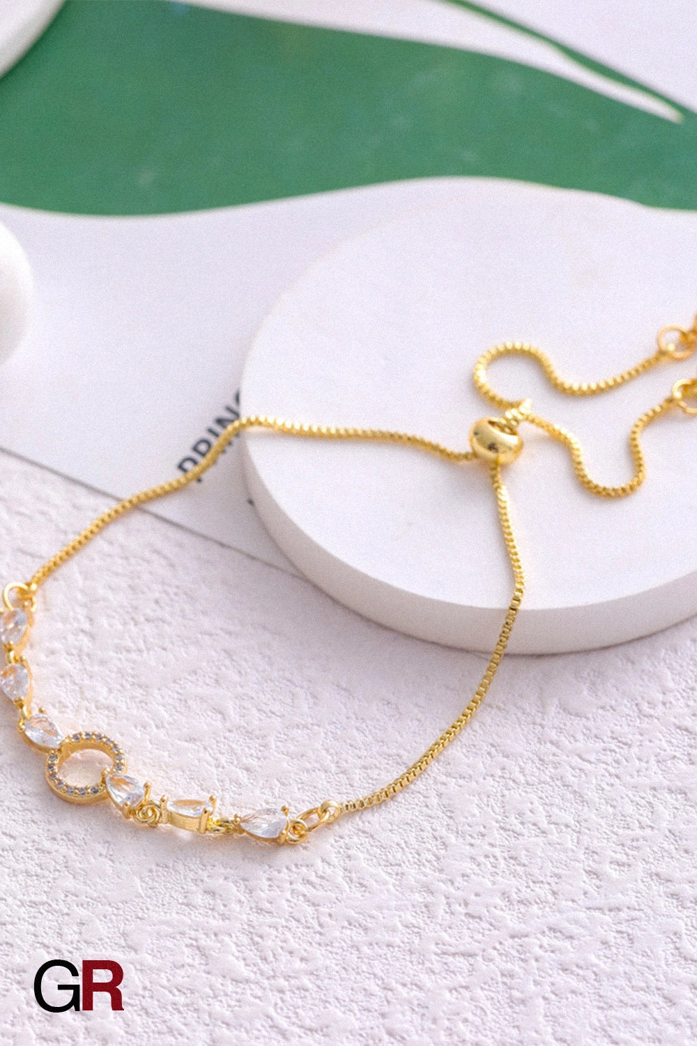 “GlamoROZ Lune Éclat Luminous Silver Circle Bracelet Jewelry styled on model wrist with minimal outfit”