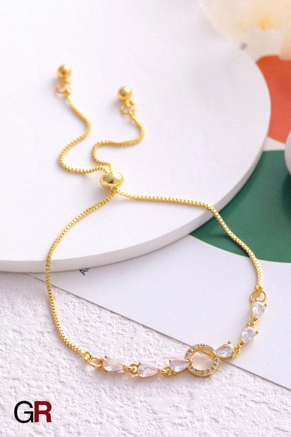 “GlamoROZ Lune Éclat Luminous Silver Circle Bracelet Jewelry front view on neutral background”