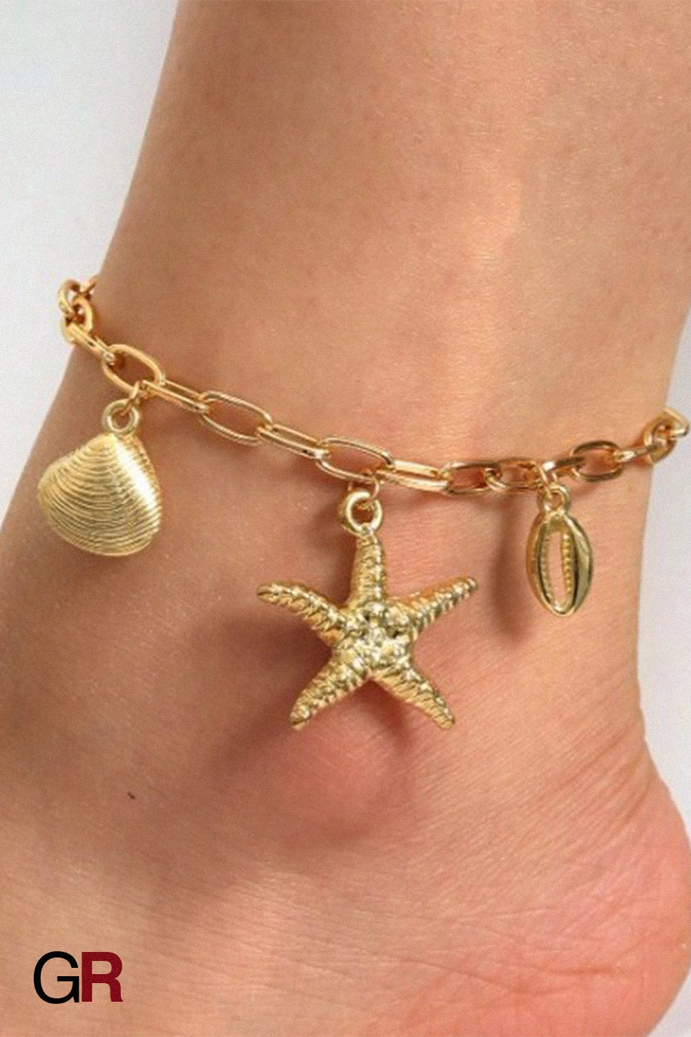 “GlamoROZ Étoile Marine Luminous Starfish Gold Anklet Jewelry front view on neutral background”