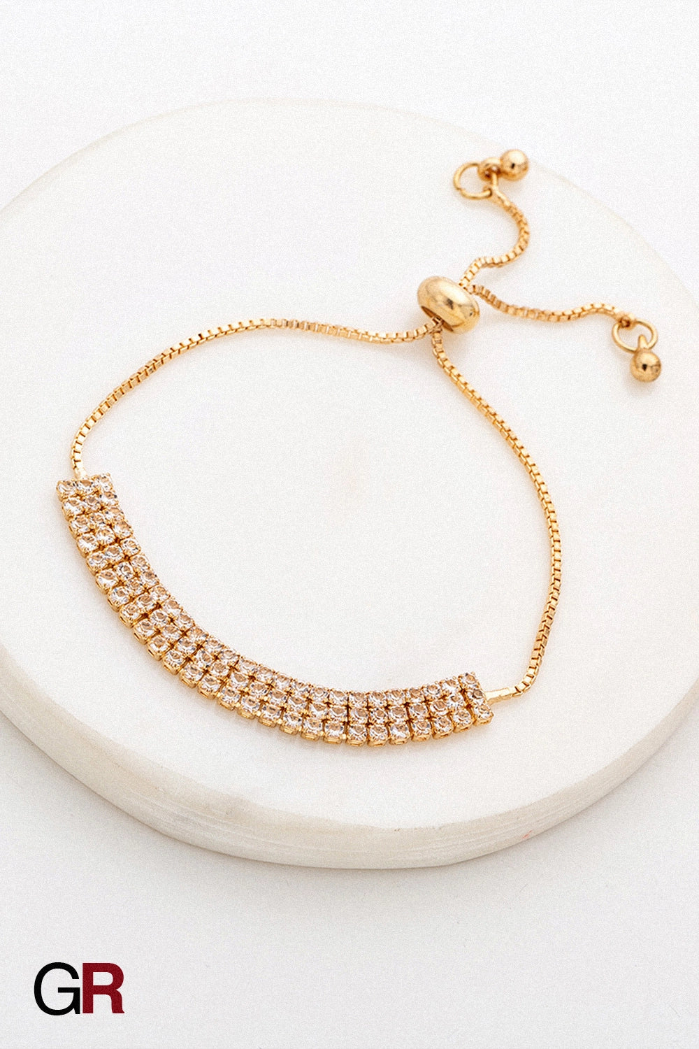 “GlamoROZ Lumiere Pavé Luminous Crystal Link Bracelet Jewelry styled on model wrist with elegant outfit”