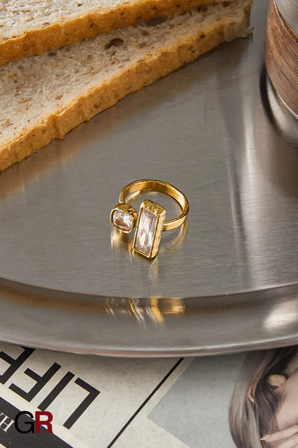 “GlamoROZ Aurum Prism Gold & Titanium Steel Ring Jewelry close-up of gold plating and crystal micro-inlay detail”