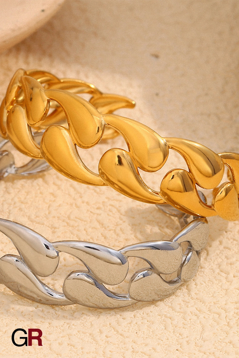 “GlamoROZ Volute Dorée Luminous Gold Curve Cuff Jewelry styled on model wrist”