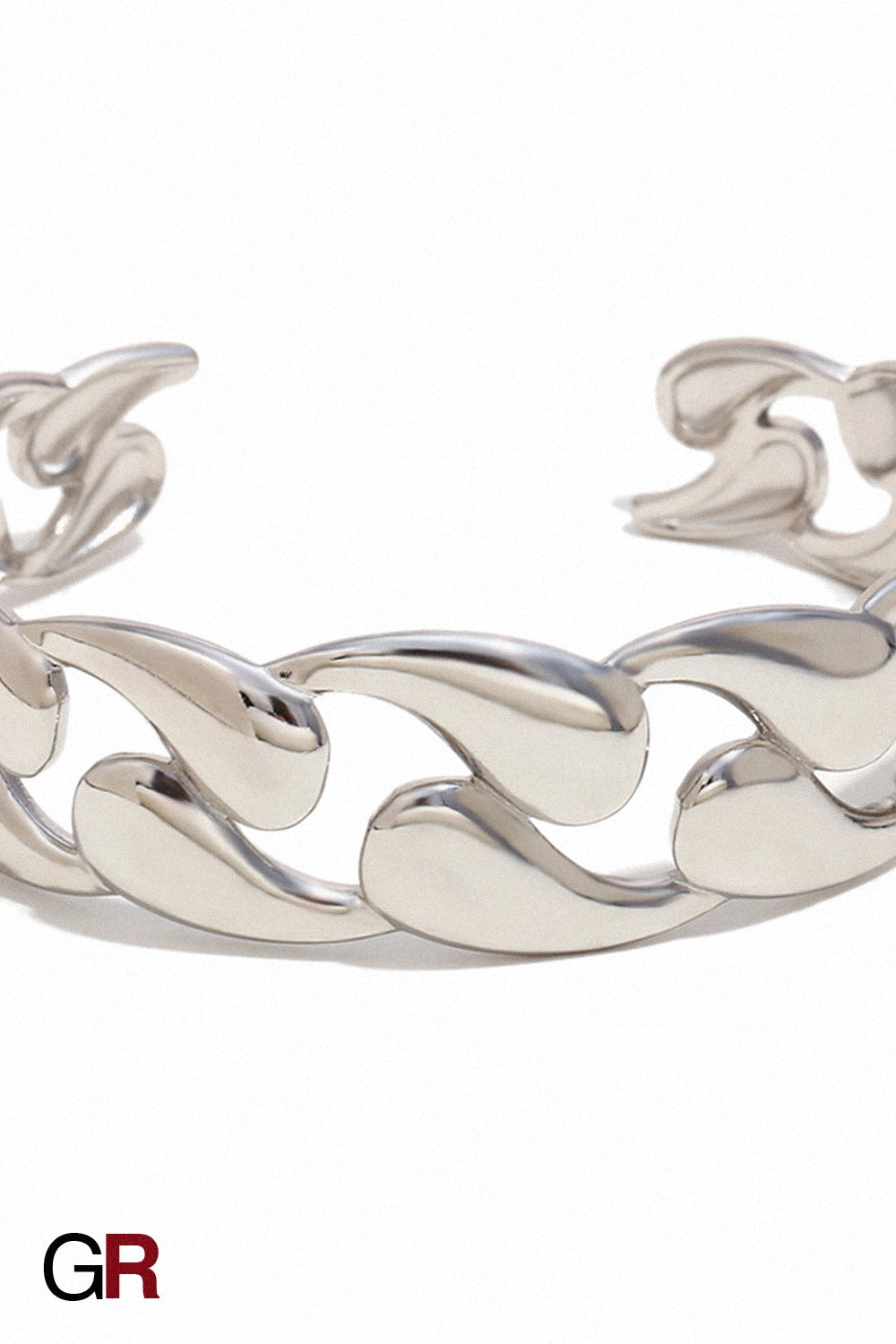 “GlamoROZ Volute Dorée Luminous Gold Curve Cuff Jewelry flat-lay on soft beige fabric background”