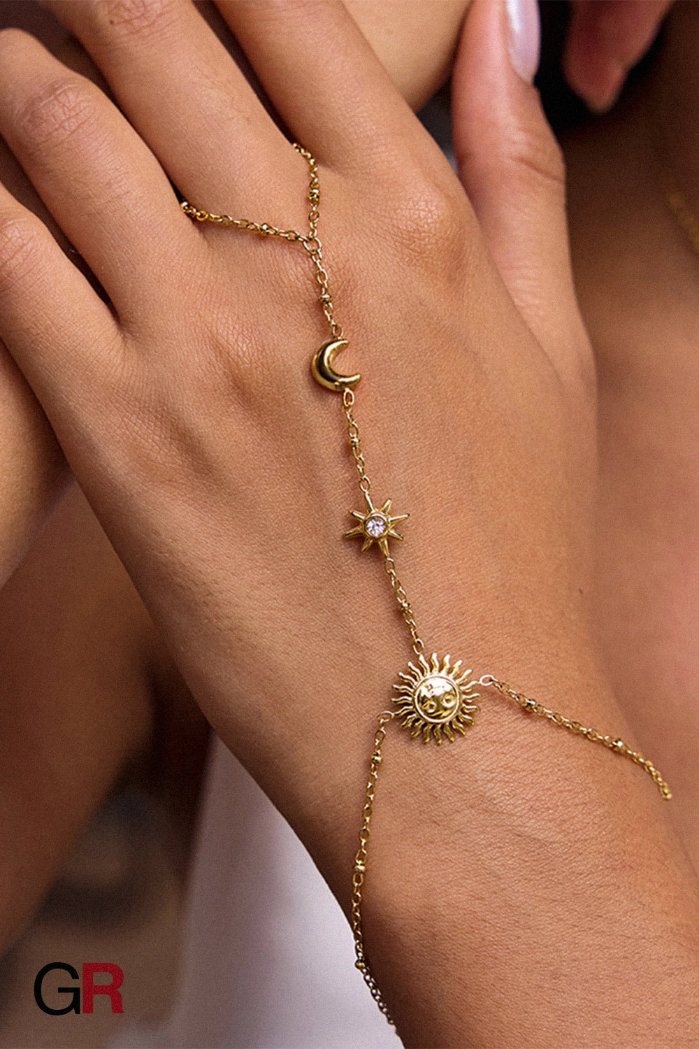 “GlamoROZ Soluna Dorée Luminous Gold Hand Chain Jewelry front view on neutral background”