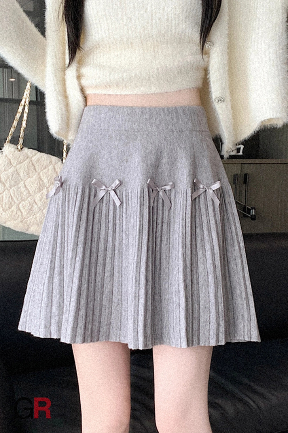 Étoile Bow-Topped Pleated Mini