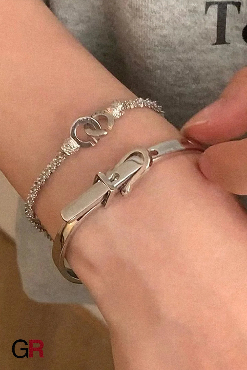 “GlamoROZ Argent Chic Luminous Silver Link Bracelet Jewelry styled on model wrist with elegant outfit”