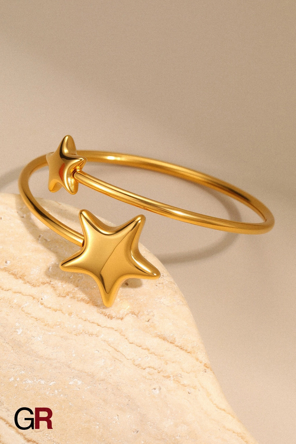 “GlamoROZ Astre Divin Luminous Gold Charm Bangle Jewelry gold plated band and detail close-up”