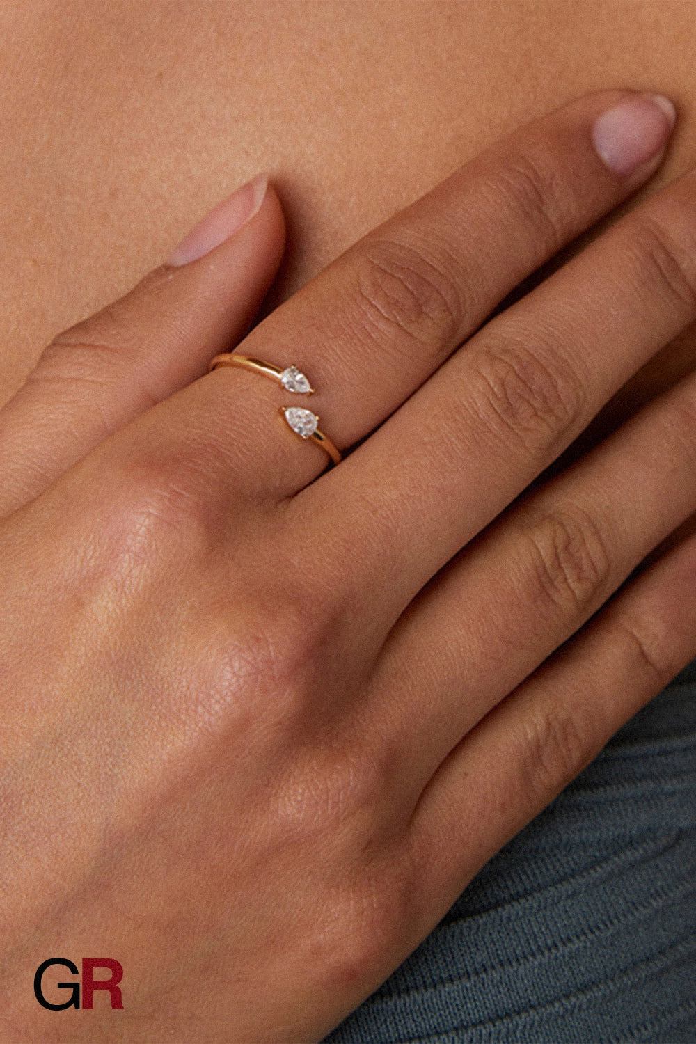 “GlamoROZ Éclat Duo Silver Teardrop Open Band Ring Jewelry front view on neutral background”