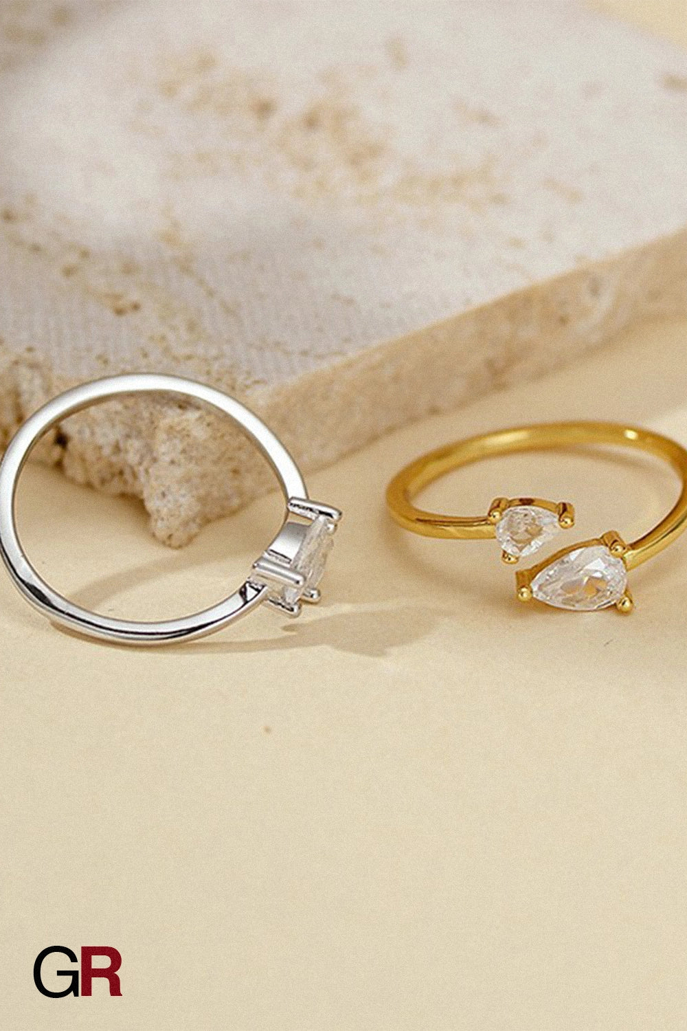 “GlamoROZ Éclat Duo Silver Teardrop Open Band Ring Jewelry macro shot highlighting crystal sparkle and silver finish”