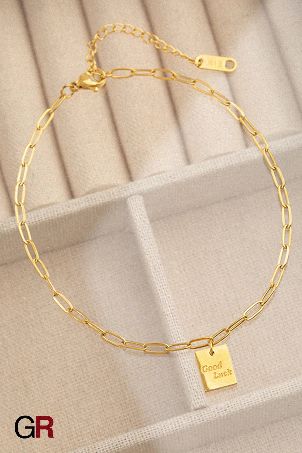 “GlamoROZ Chance Dorée Luminous Gold Charm Anklet Jewelry close-up of engraved square charm”