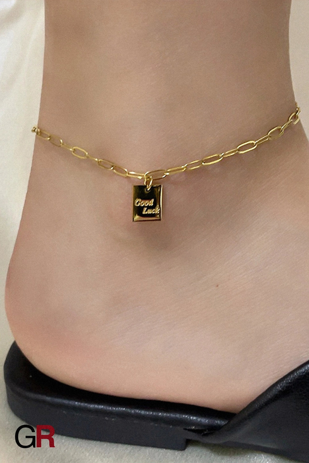 “GlamoROZ Chance Dorée Luminous Gold Charm Anklet Jewelry styled on model ankle with sandals”