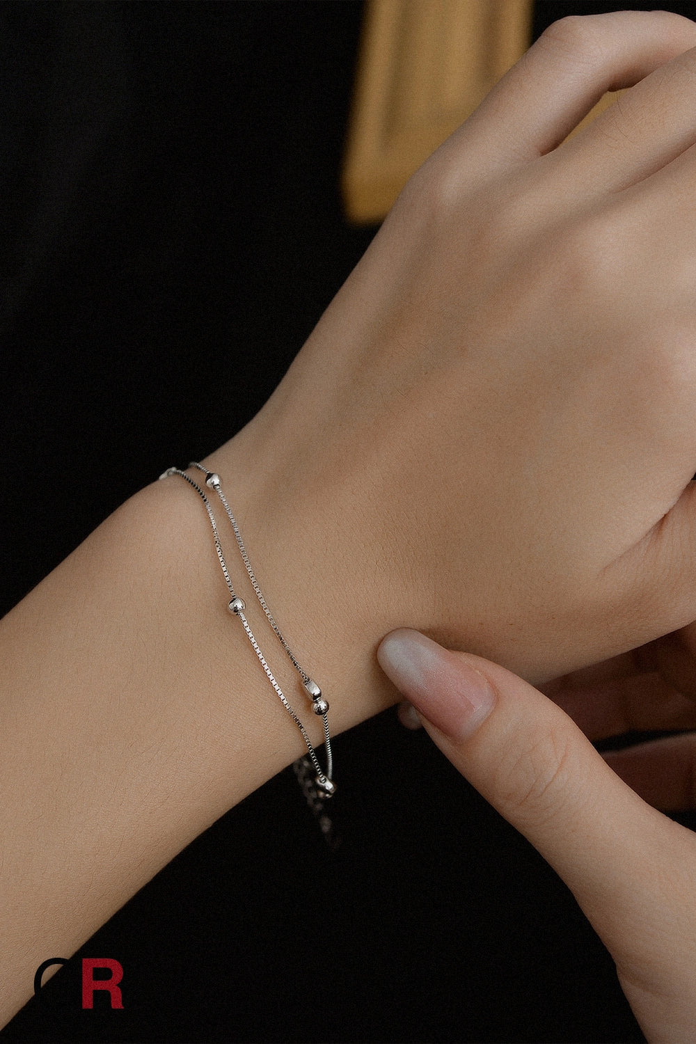 “GlamoROZ Luna Cœur Luminous Gold Beaded Bracelet Jewelry front view on neutral background”