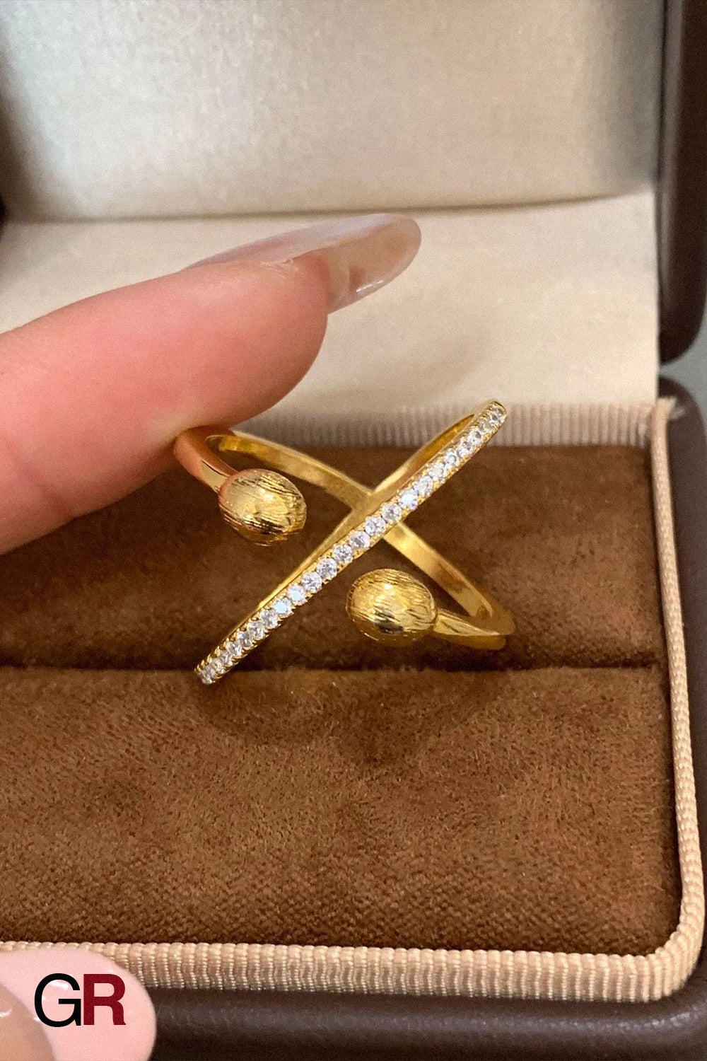 “GlamoROZ Orion Orbit Gold & Silver Chain Ring Jewelry styled on model hand with elegant outfit”