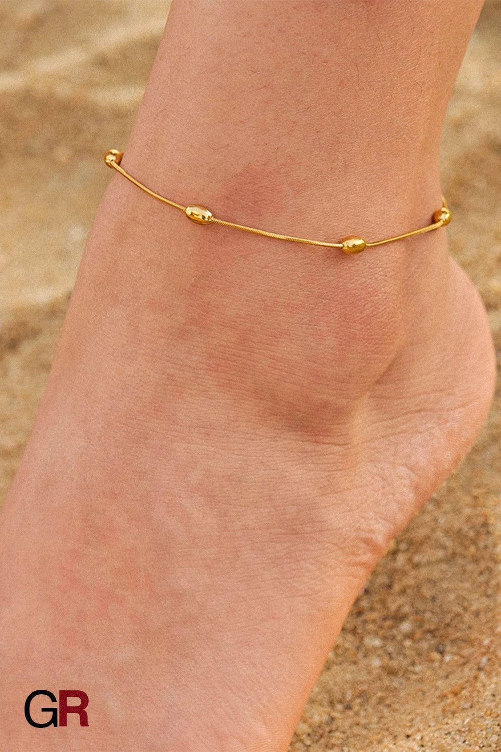 “GlamoROZ Aurora Sol Luminous Beaded Anklet front view on neutral background”