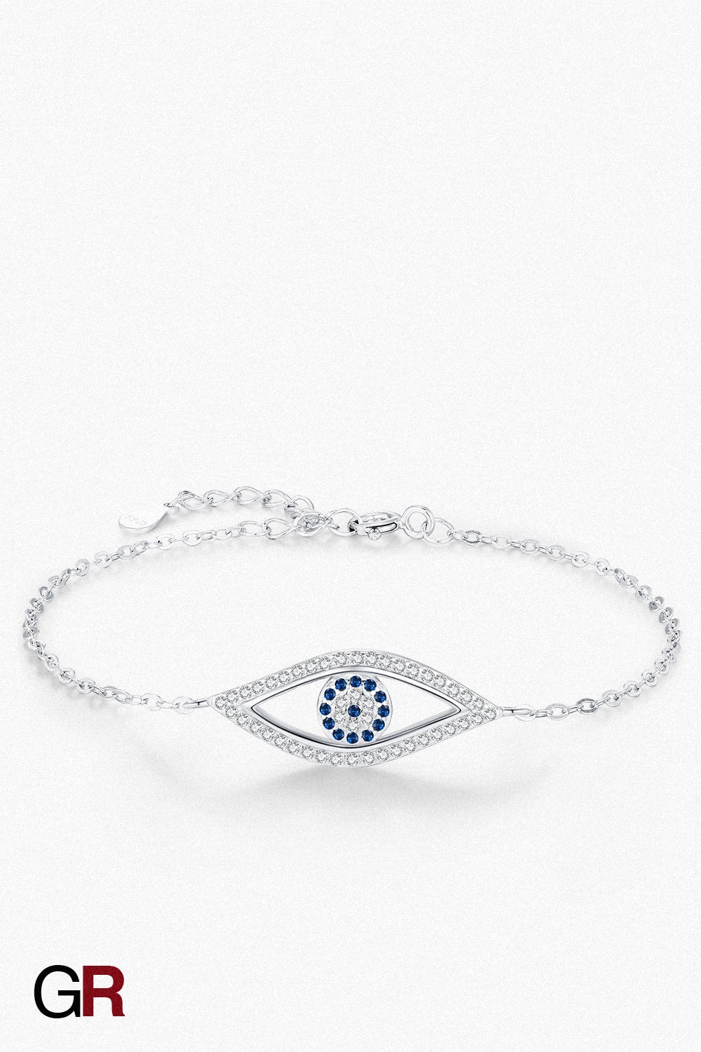 “GlamoROZ Regard Etoile Luminous Silver Eye Charm Bracelet Jewelry styled on model wrist with elegant outfit”