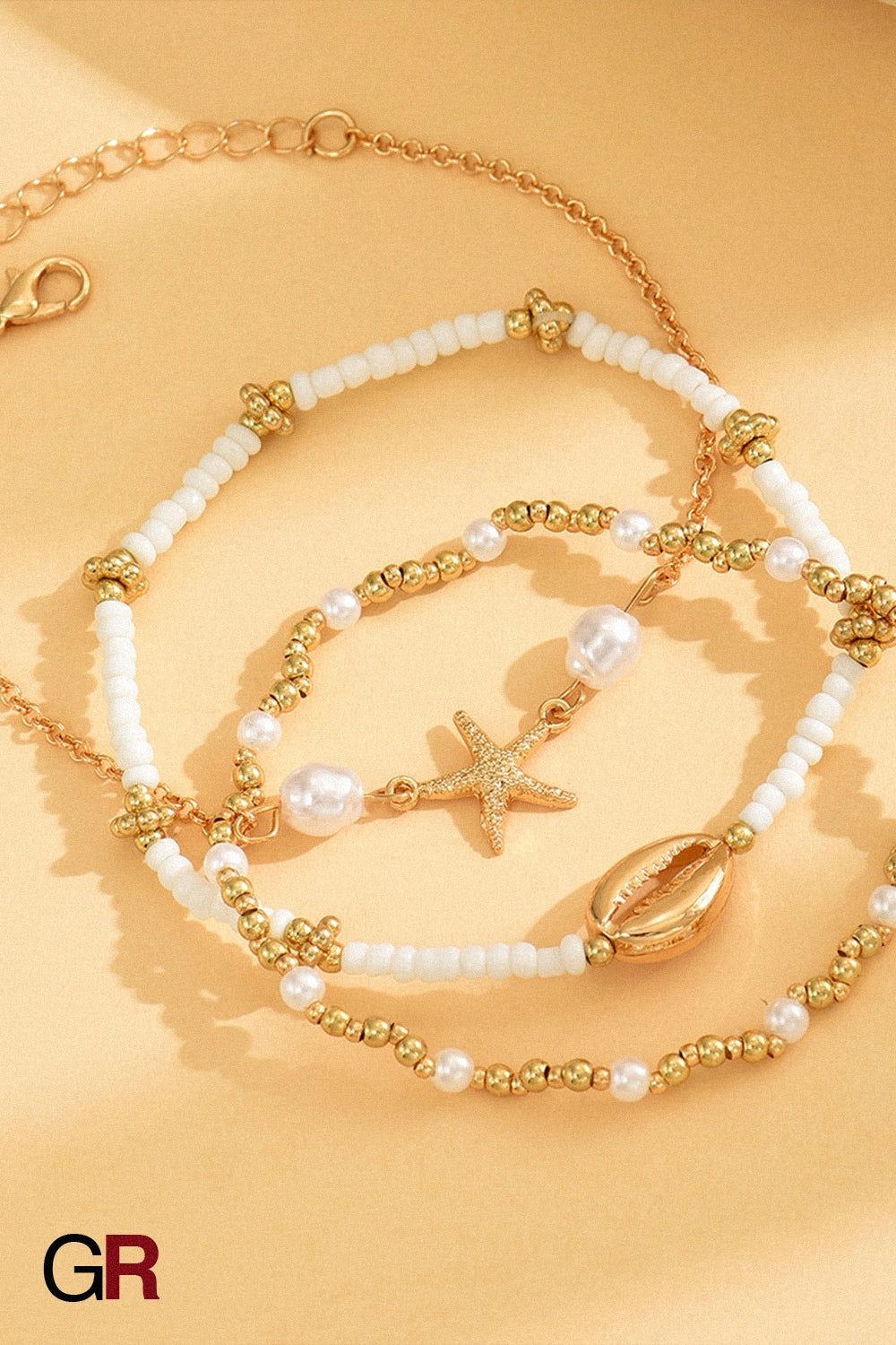 “GlamoROZ Étoile de Mer Layered Anklet Set gold-plated chain detail and clasp view”