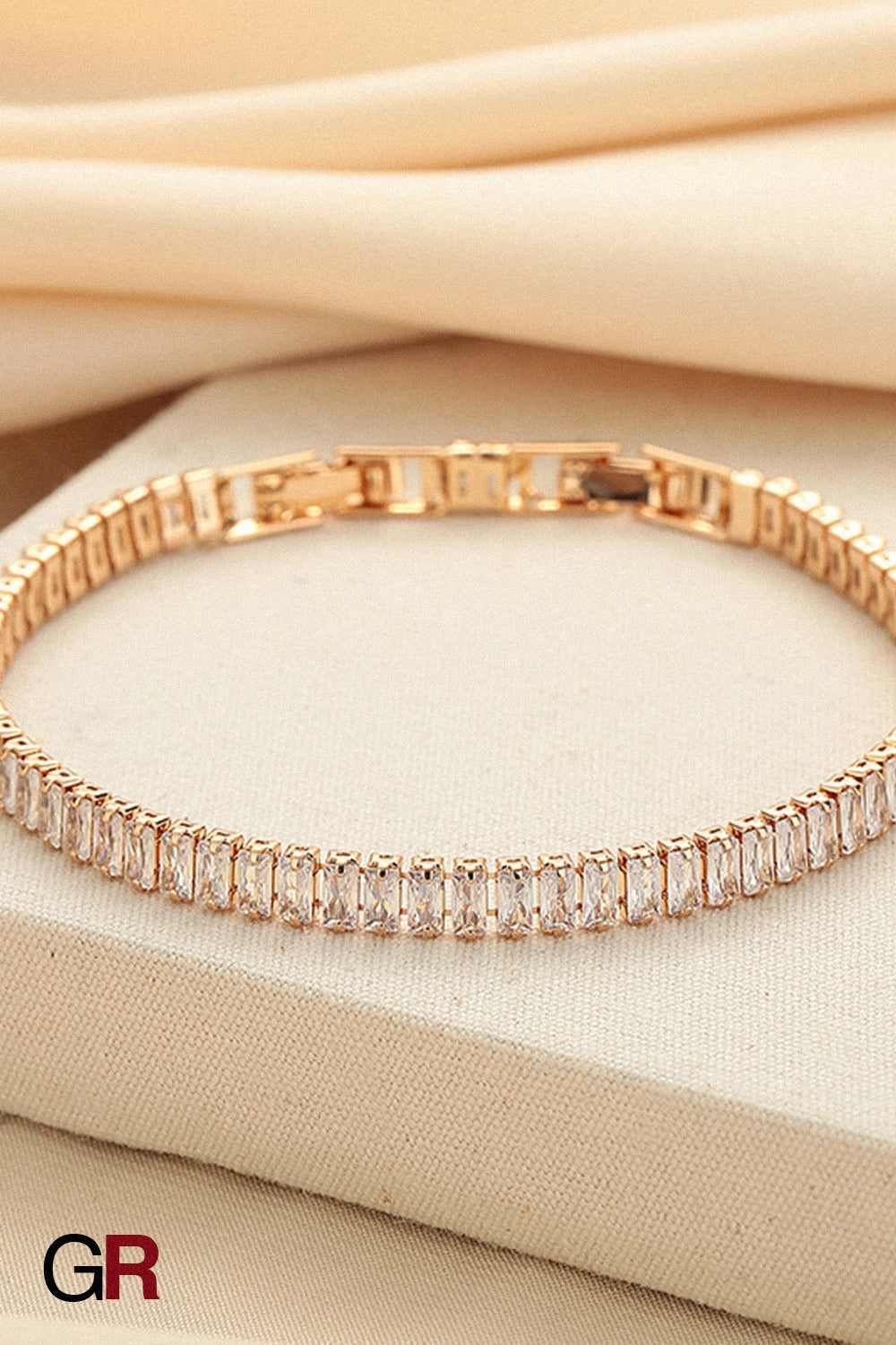 “GlamoROZ Lumiere Baguette Luminous Crystal Link Bracelet Jewelry close-up of gold link and baguette crystal detail”