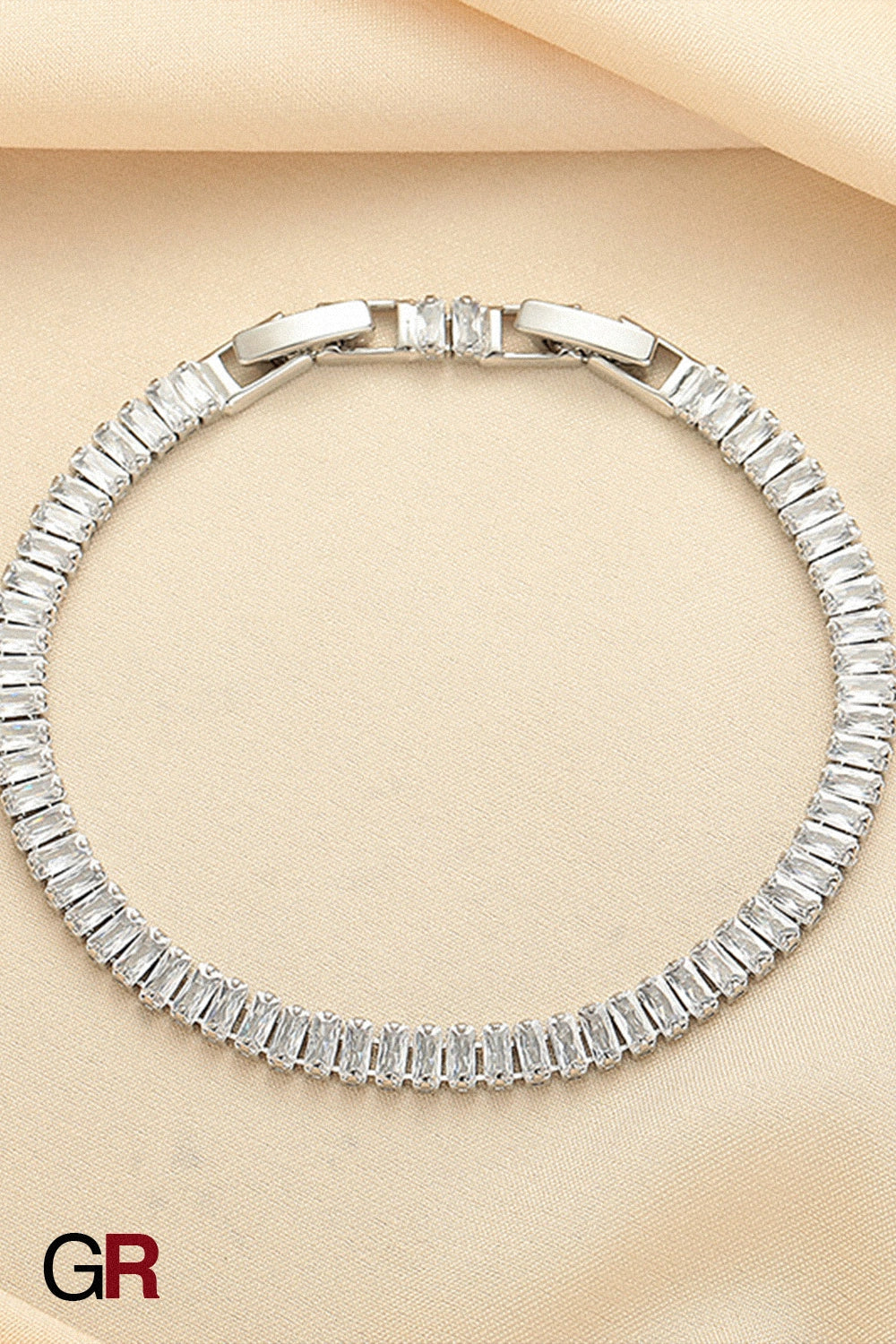 “GlamoROZ Lumiere Baguette Luminous Crystal Link Bracelet Jewelry styled on model wrist with elegant outfit”