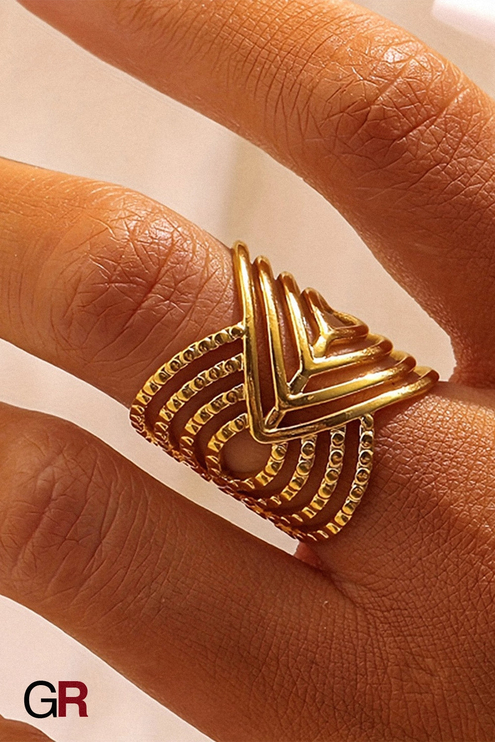 “GlamoROZ Aurum Apex Geometric Ring Jewelry front view on neutral background”
