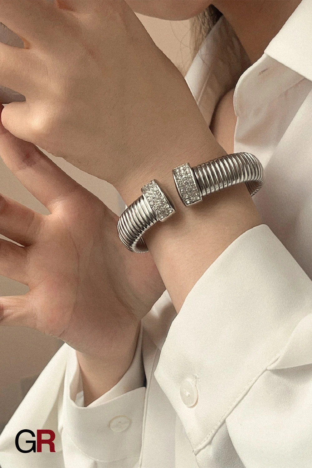 “GlamoROZ Lustre Dore Luminous Gold Wide Rib Cuff Jewelry flat-lay on soft beige fabric background”