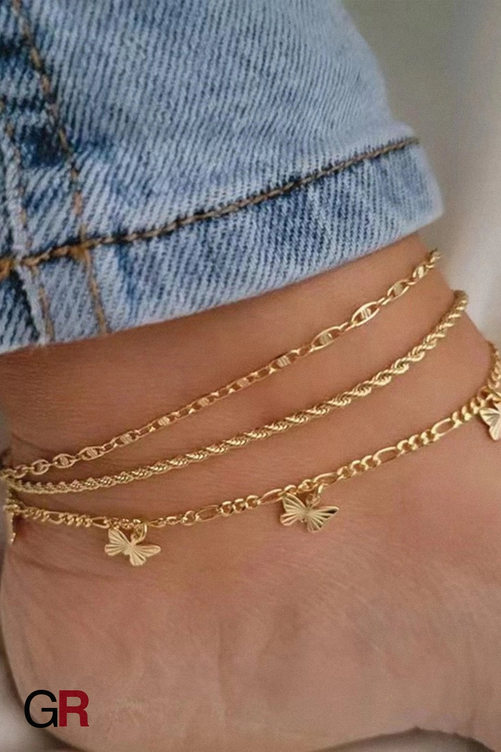“GlamoROZ Jardin Papillon Golden Anklet Set butterfly charm and layered chain detail close-up”