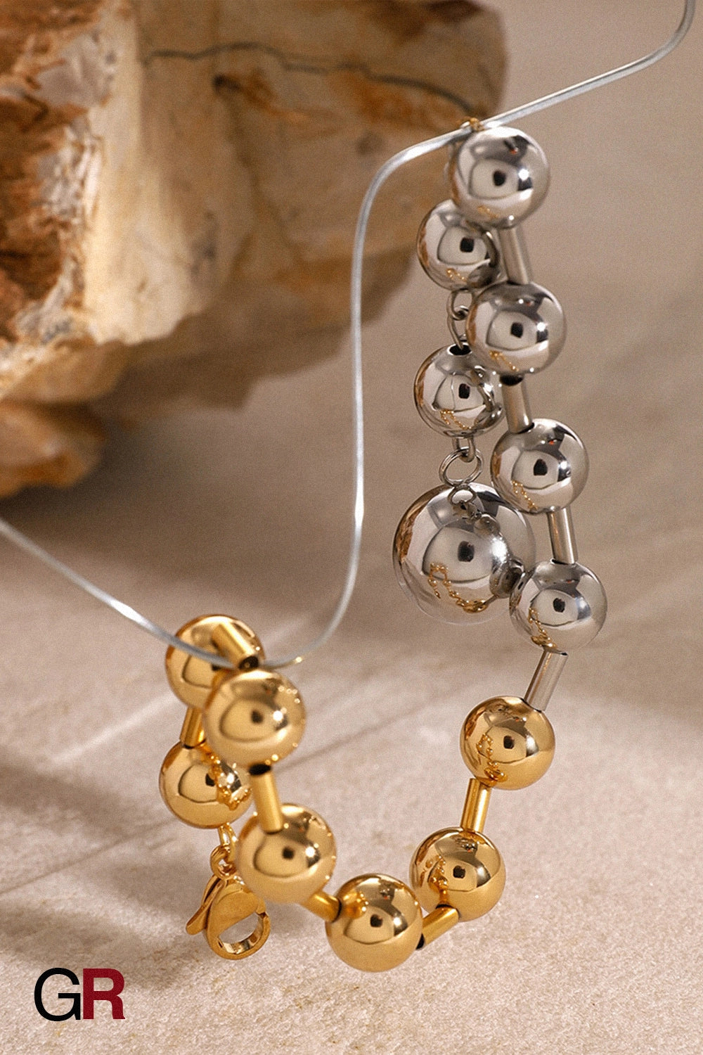 “GlamoROZ Éclat Doré Luminous Gold Bead Bracelet Jewelry gold chain and clasp detail close-up”